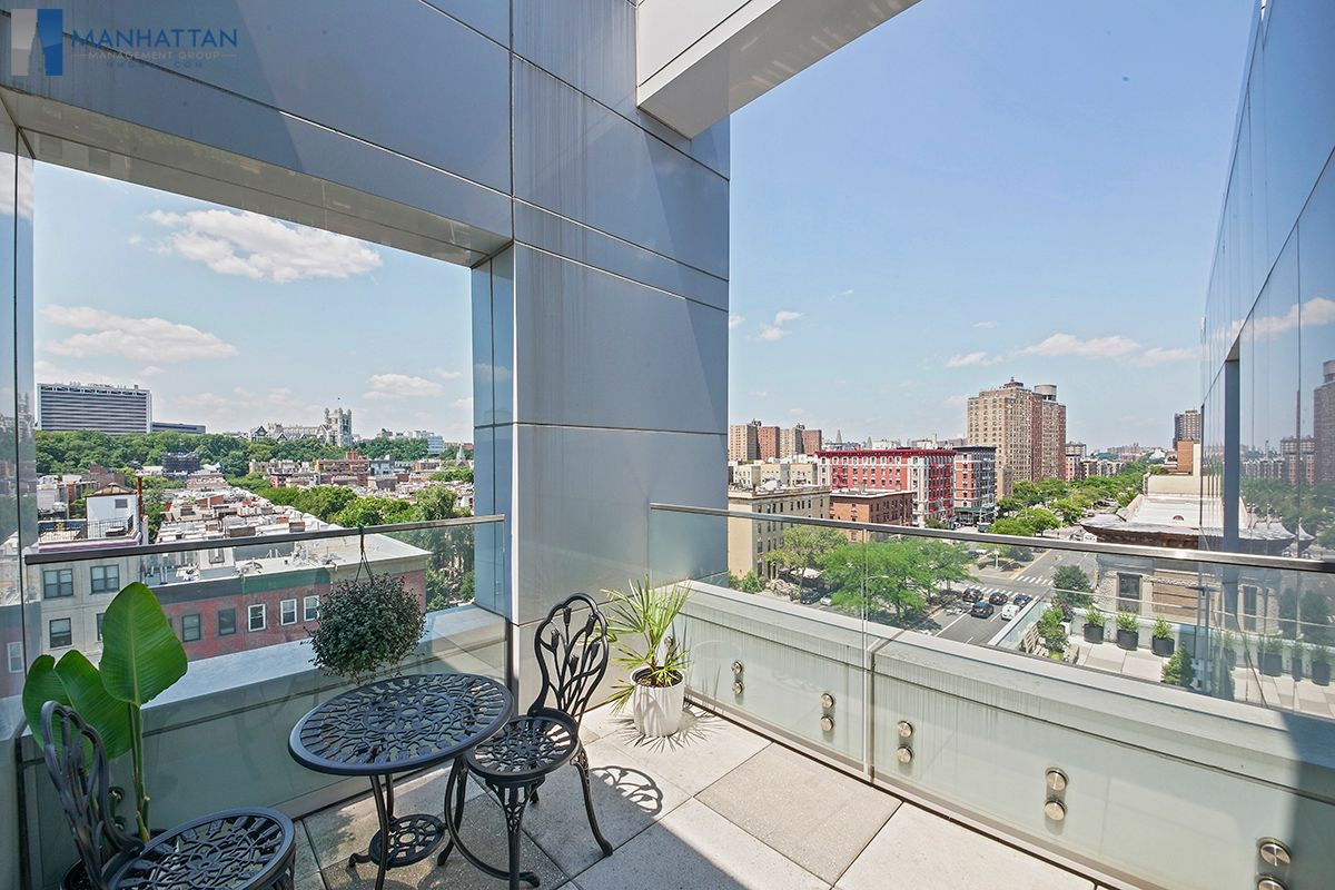 Open-sky views over Harlem’s iconic rooftops, brownstones, and beyond.